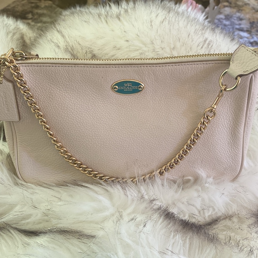 Coach leather wristlet with gold chain